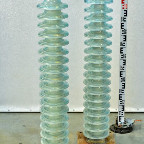 Pair of high-voltage glass fog-type insulator towers Pair of high-voltage glass fog-type insulator towers