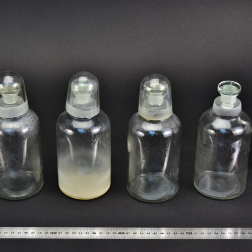 4-Piece Set of Small Clear Acid Bottles with Ground-Glass Stoppers and Three Glass Protective Caps – No. 1 4-Piece Set of Small Clear Acid Bottles with Ground-Glass Stoppers and Three Glass Protective Caps – No. 1