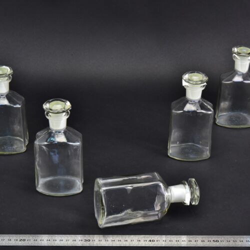 5-Piece Set of Clear Faceted Laboratory Liquid Bottles with Shaped Ground-Glass Stoppers – No. 9 5-Piece Set of Clear Faceted Laboratory Liquid Bottles with Shaped Ground-Glass Stoppers – No. 9