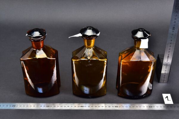 3-Piece Set of Large 1-Litre Amber Faceted Laboratory Liquid Bottles with Shaped Ground-Glass Stoppers – No. 1 3-Piece Set of Large 1-Litre Amber Faceted Laboratory Liquid Bottles with Shaped Ground-Glass Stoppers – No. 1
