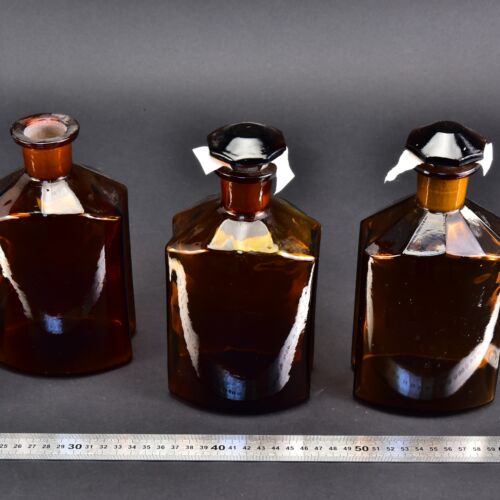 3-Piece Set of Large 1-Litre Amber Faceted Laboratory Liquid Bottles with Shaped Ground-Glass Stoppers – No. 3 3-Piece Set of Large 1-Litre Amber Faceted Laboratory Liquid Bottles with Shaped Ground-Glass Stoppers – No. 3