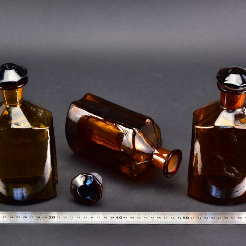 3-Piece Set of Large 1-Litre Amber Faceted Laboratory Liquid Bottles with Shaped Ground-Glass Stoppers – No. 4 3-Piece Set of Large 1-Litre Amber Faceted Laboratory Liquid Bottles with Shaped Ground-Glass Stoppers – No. 4