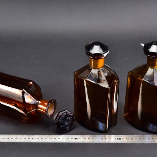 3-Piece Set of Large 1-Litre Amber Faceted Laboratory Liquid Bottles with Shaped Ground-Glass Stoppers – No. 6 3-Piece Set of Large 1-Litre Amber Faceted Laboratory Liquid Bottles with Shaped Ground-Glass Stoppers – No. 6
