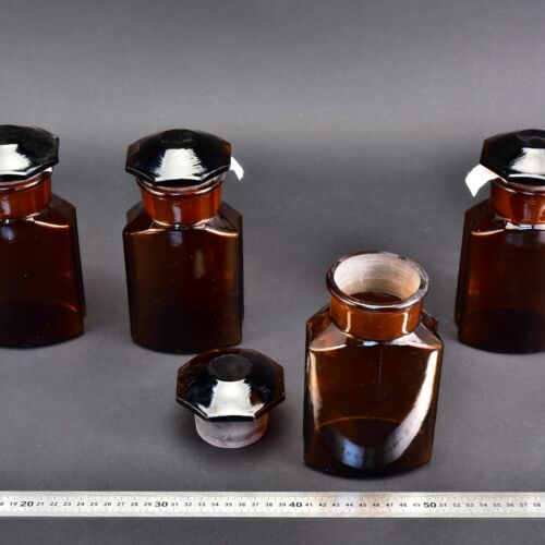 4-Piece Set of Amber Faceted Laboratory Powder Bottles with Large Shaped Ground-Glass Stoppers 4-Piece Set of Amber Faceted Laboratory Powder Bottles with Large Shaped Ground-Glass Stoppers