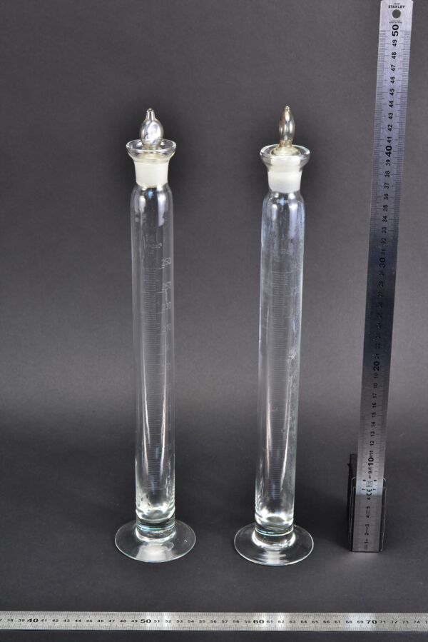 Tall 250 ml footed glass graduated cylinders with ground-glass stoppers – set of 2 Tall 250 ml footed glass graduated cylinders with ground-glass stoppers – set of 2
