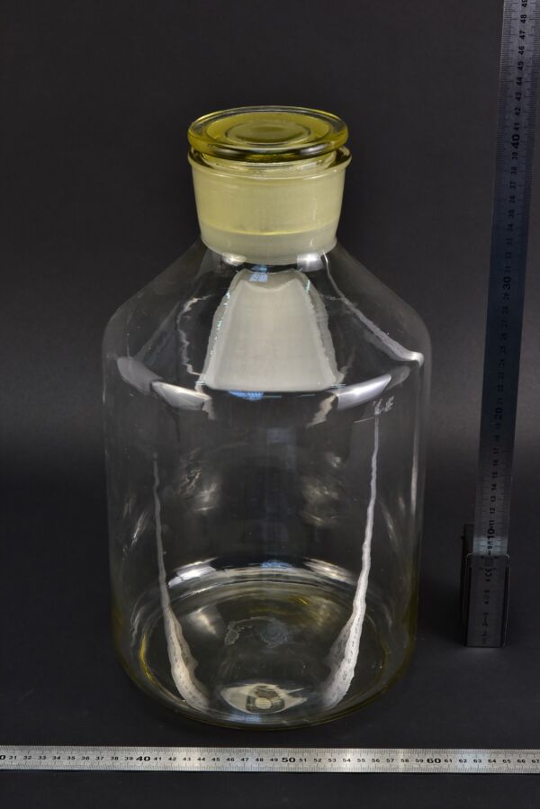 Oversized clear powder jar with wide ground-glass stopper Oversized clear powder jar with wide ground-glass stopper