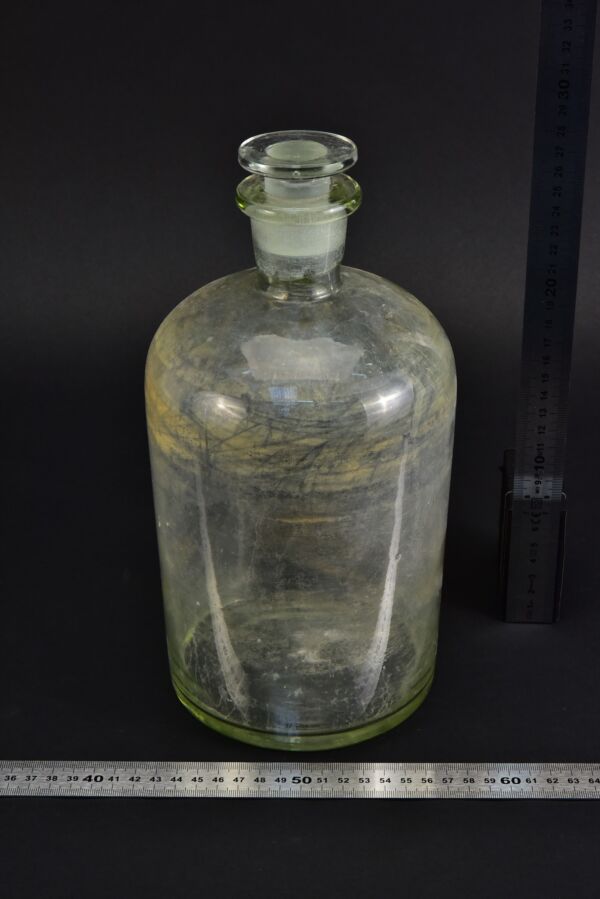 Clouded clear reagent bottle with ground-glass stopper