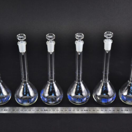 Set of six volumetric flasks with blue markings and octagonal-headed glass stoppers, 100 ml – No. 1