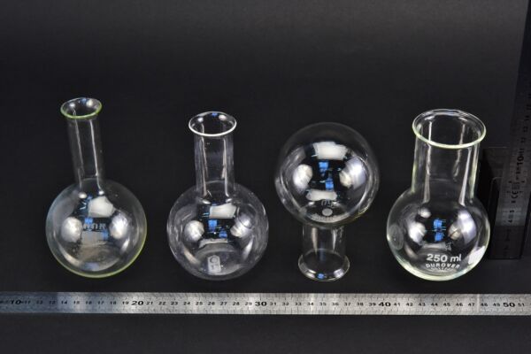 Set of four assorted laboratory flasks Set of four assorted laboratory flasks