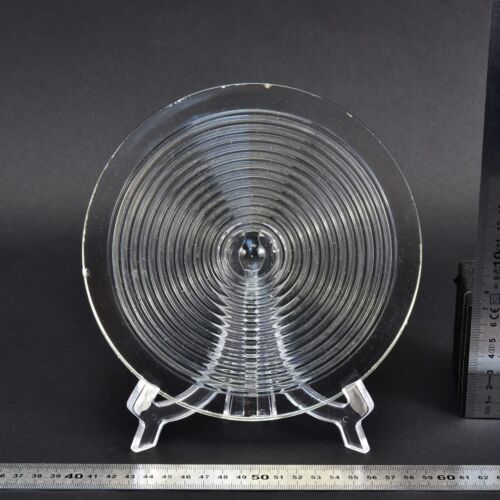 Clear glass Fresnel lens recovered from a ruined glass factory Clear glass Fresnel lens recovered from a ruined glass factory