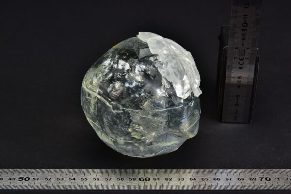 Cracked cocoon-shaped solid glass block Cracked cocoon-shaped solid glass block