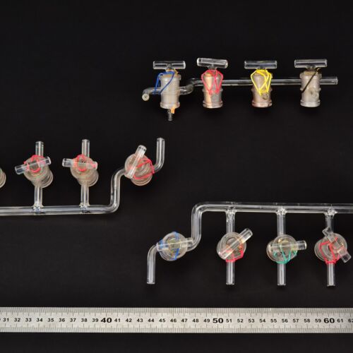 Set of three four-stopcock laboratory glass manifolds with bent end branch – No. 1 Set of three four-stopcock laboratory glass manifolds with bent end branch – No. 1