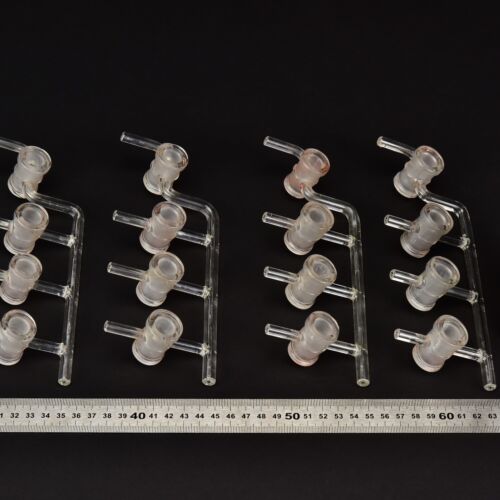 Set of four laboratory glass manifold bodies with four stopcock barrels, without plugs – No. 3 Set of four laboratory glass manifold bodies with four stopcock barrels, without plugs – No. 3