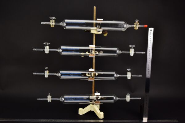 Set of four long glass gas sampling tubes with twin stopcocks