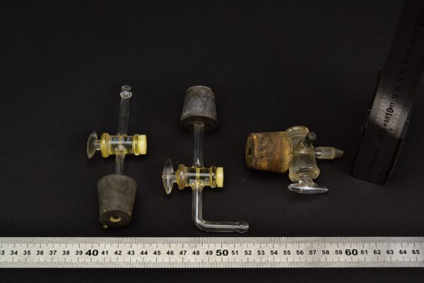 Set of three laboratory glass stopcocks with bungs Set of three laboratory glass stopcocks with bungs