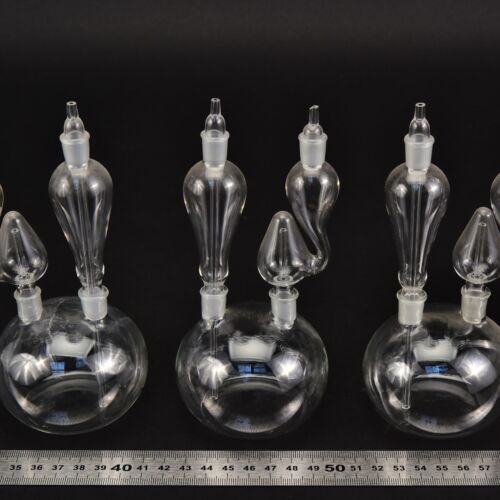 Two-neck laboratory glass apparatus with shaped attachments – set of three Two-neck laboratory glass apparatus with shaped attachments – set of three