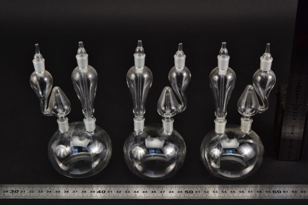 Two-neck laboratory glass apparatus with shaped attachments – set of three