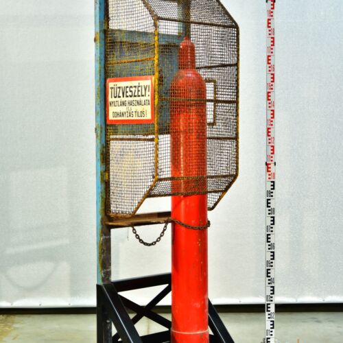 Industrial Hydrogen Cylinder in a Mesh Safety Storage Rack Industrial Hydrogen Cylinder in a Mesh Safety Storage Rack