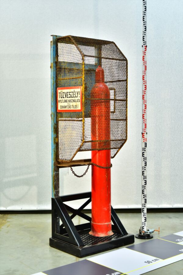 Industrial Hydrogen Cylinder in a Mesh Safety Storage Rack Industrial Hydrogen Cylinder in a Mesh Safety Storage Rack